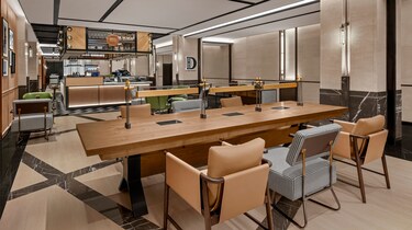 Modern lounge with wood table and bar