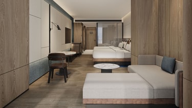带两张床及休闲区的客房