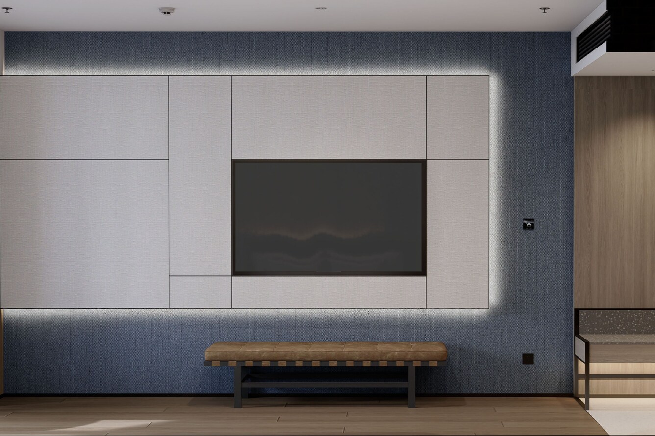 Guest room with TV and open closet