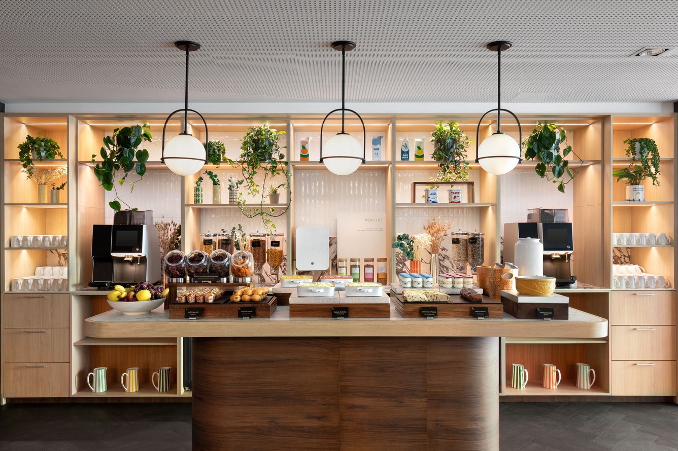 Breakfast buffet with yogurts, cereals and fruits