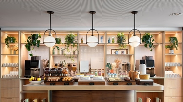 Breakfast buffet with yogurts, cereals and fruits