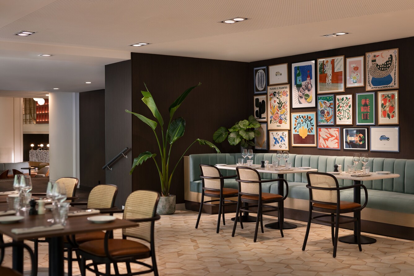 Palyma Bistro dining room with artwork and seating