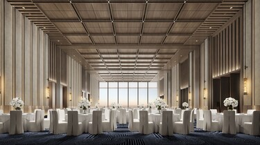 ballroom with white event chairs