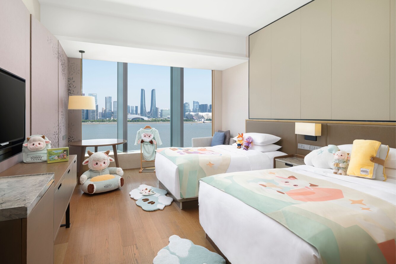 Two-bed guest room with skyline view
