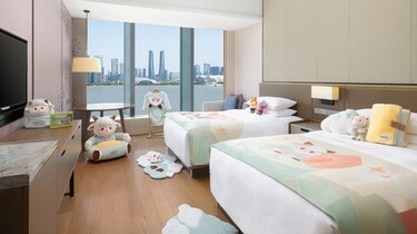 Two-bed guest room with skyline view