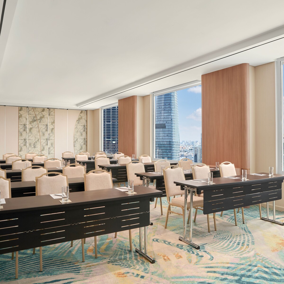 Classroom-style meeting room with city views