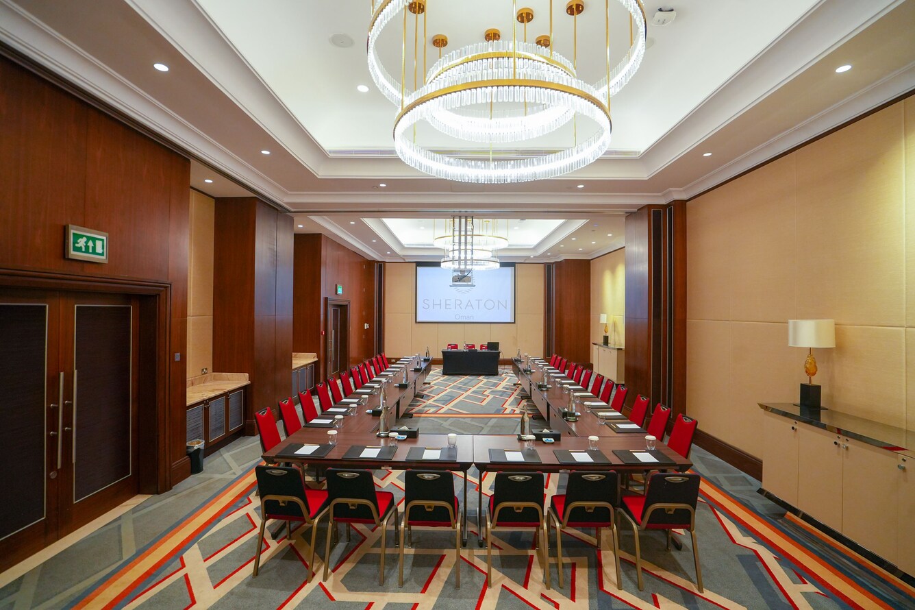 Meeting room with U-shape table and lights