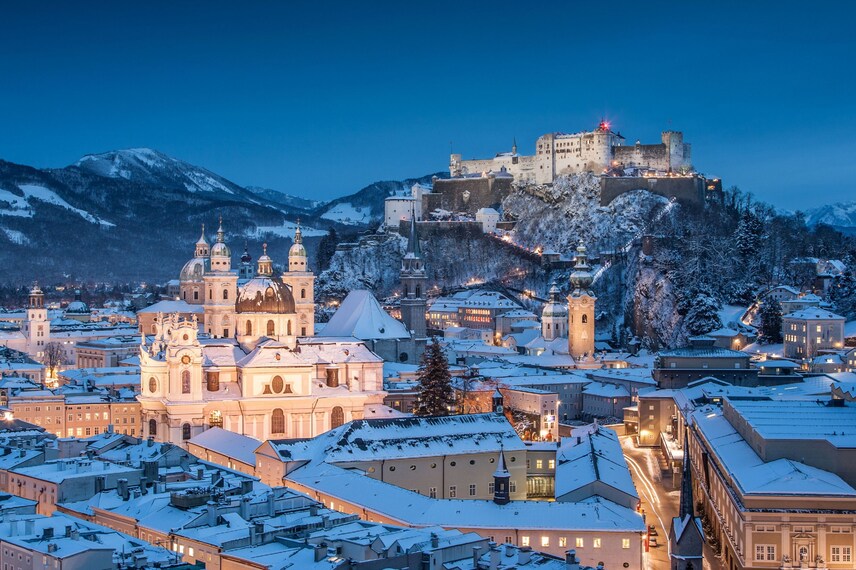 Salzburg fortress and skyline at dawn.