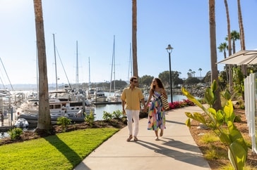 Couple walking around marina
