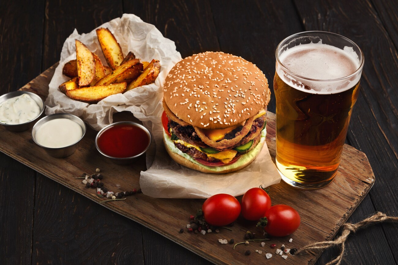 Fast food restaurant dish. Hamburger and fries wedges