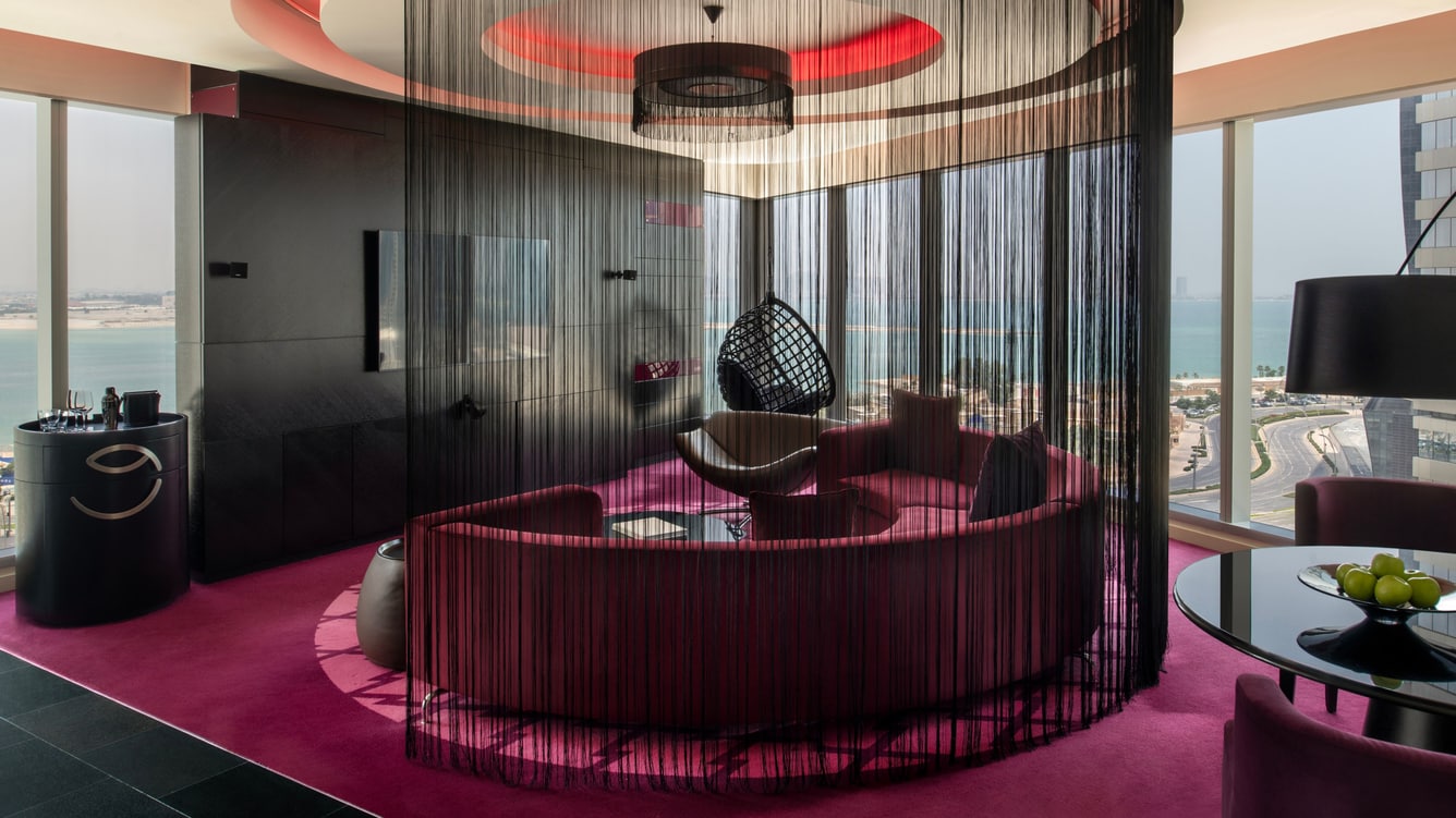 Suite living area with sea view and seating