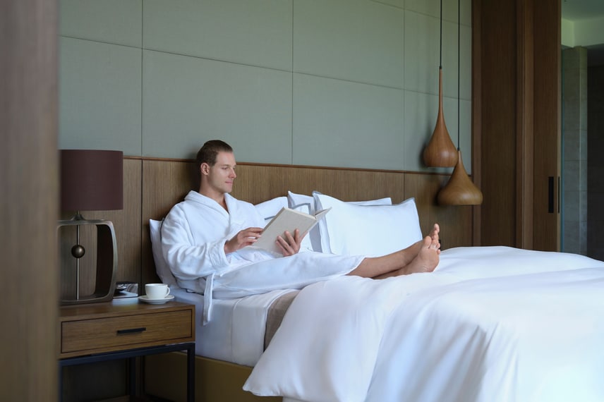 Couple relaxing in hotel room