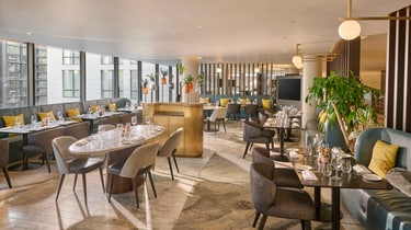 Tables, chairs, restaurant interior, city view