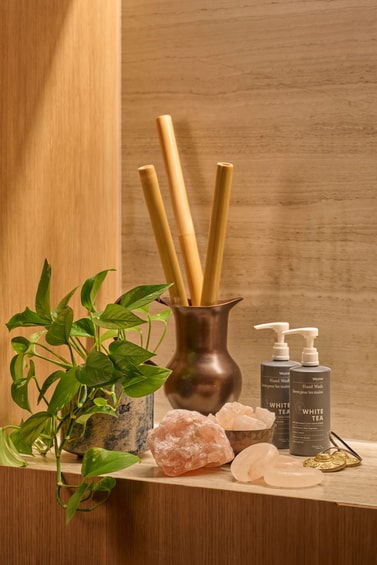Crystals and bamboo sticks for spa treatments.